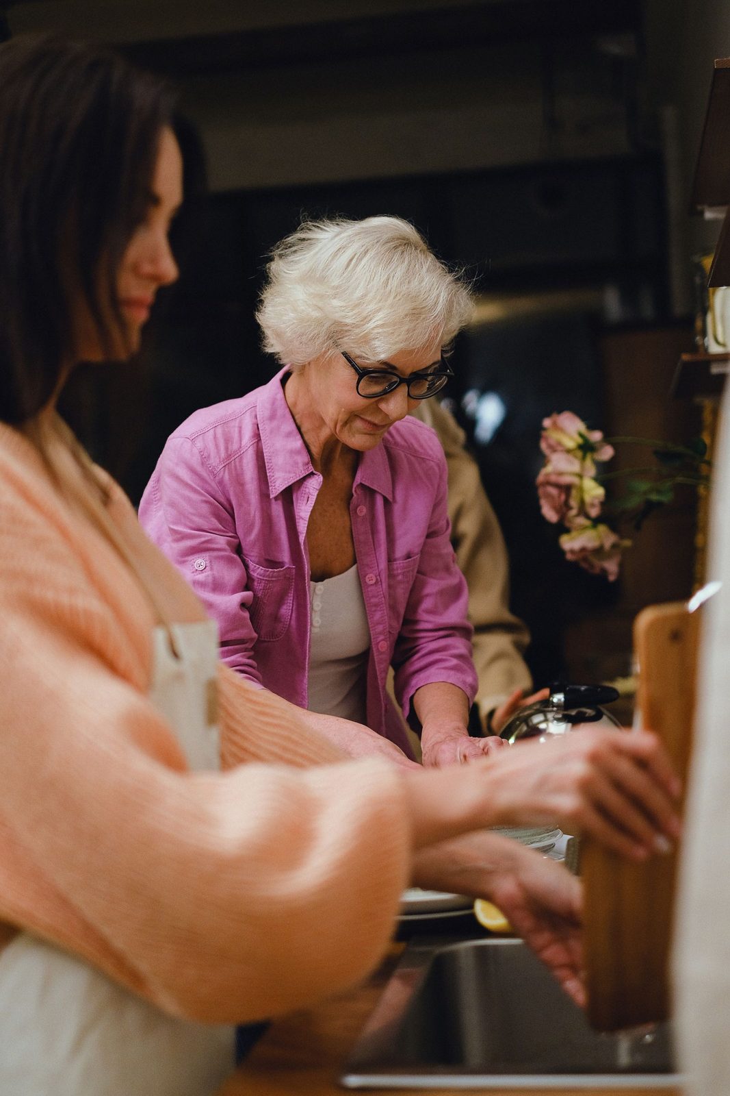 High angle view of a senior woman enjoying a meal prepared by a caregiver